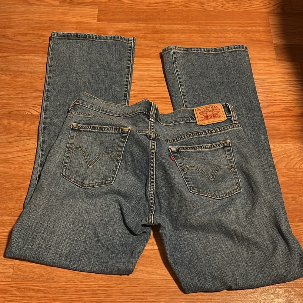 preowned women’s Levi 515 bootcut size 10 M color light blue
